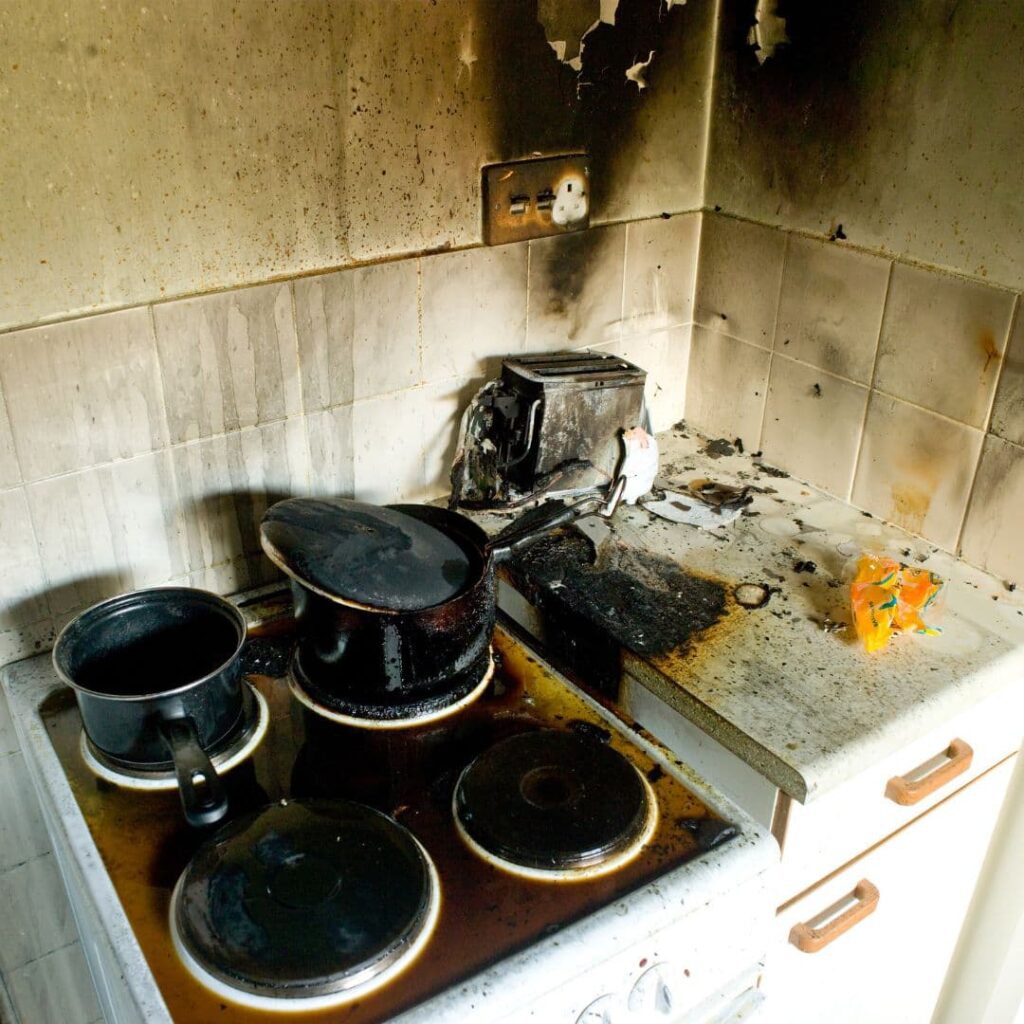 Cooking Fire Damage Restoration. Picture of a burned out stovetop. This is one of many types of property damage emergencies.