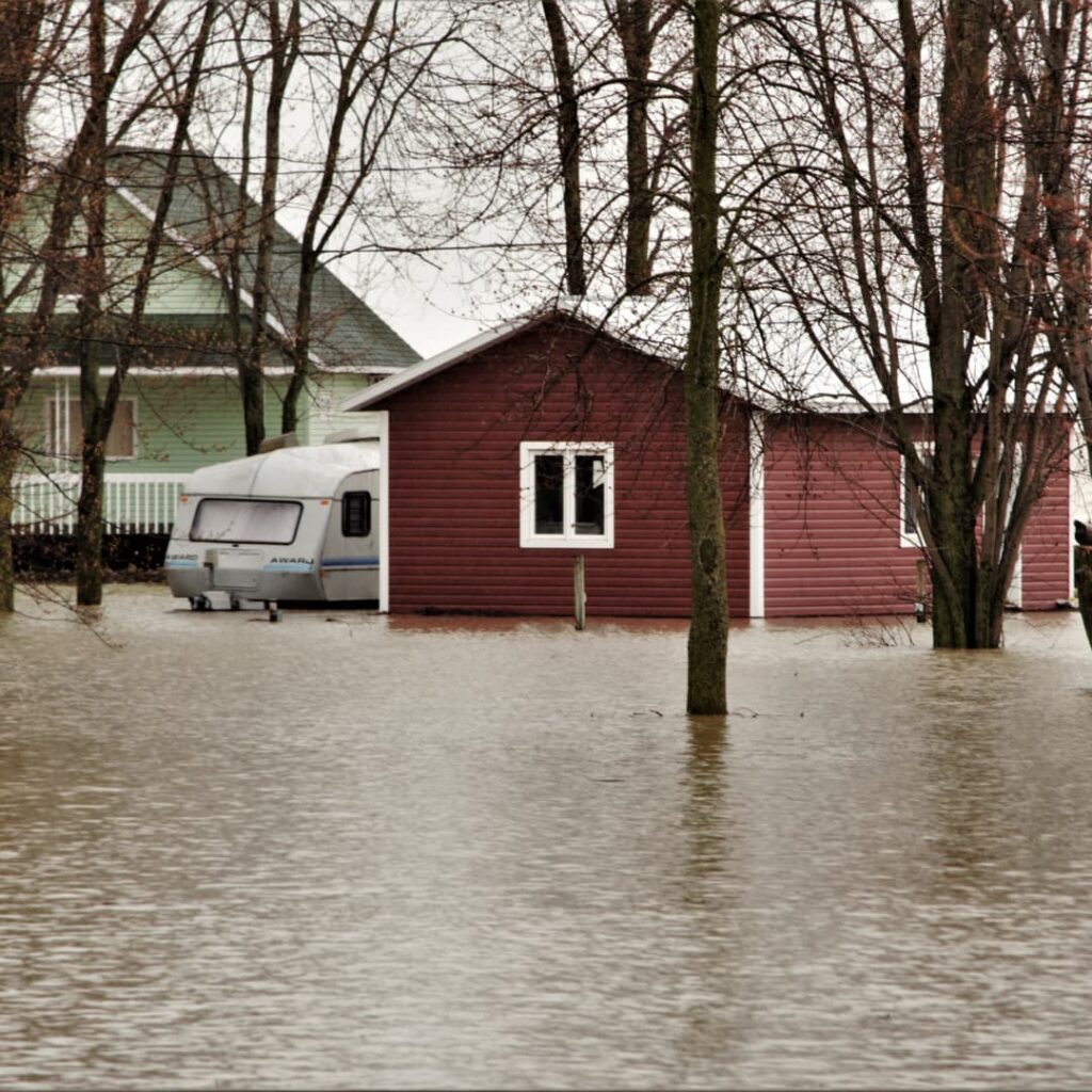 An exterior image of a flooded home