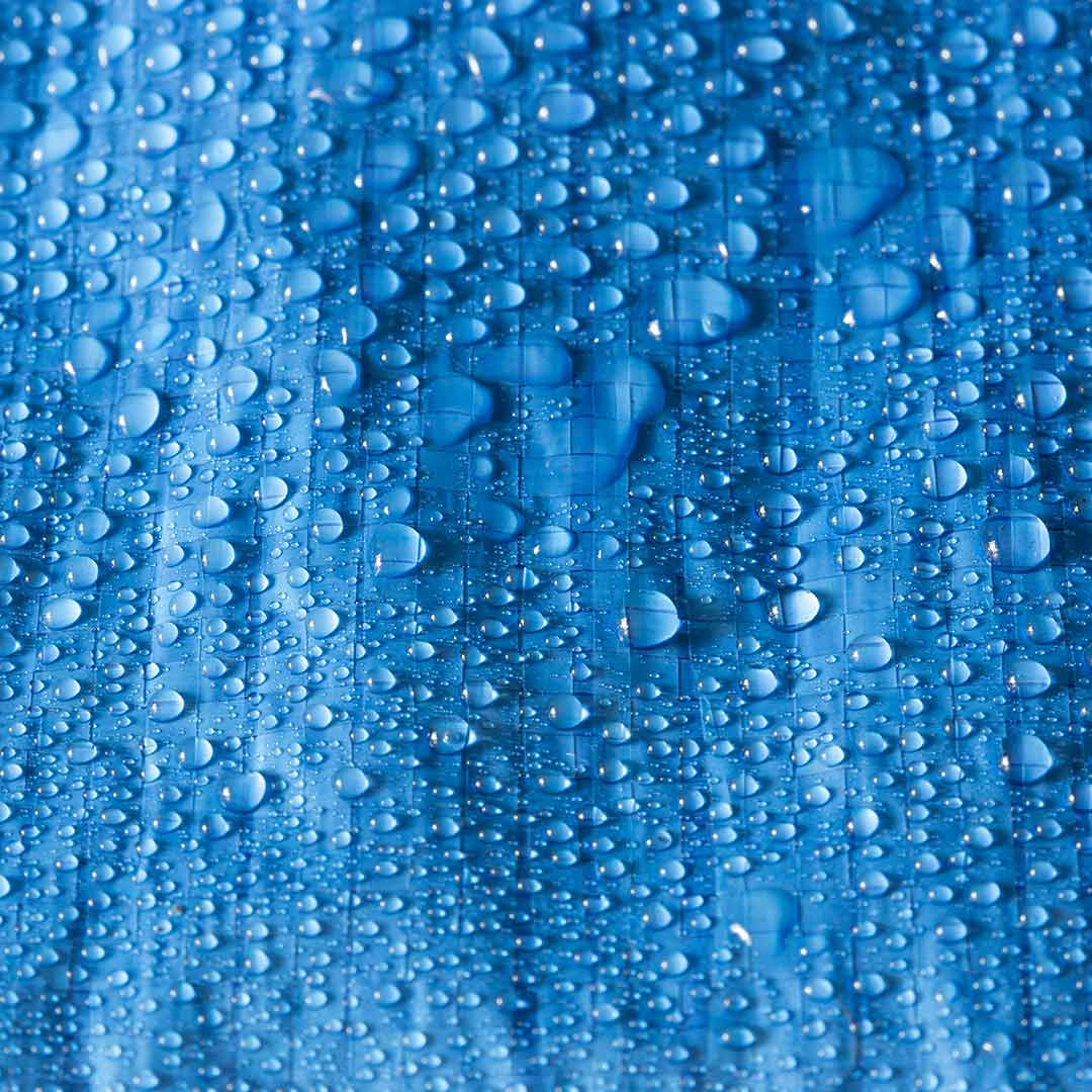 Water droplets on blue tarp